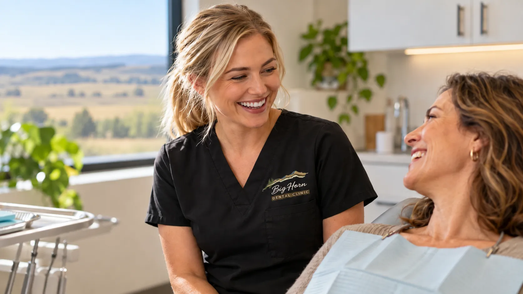 A Big Horn Dental Clinic hygienist with a smiling patient